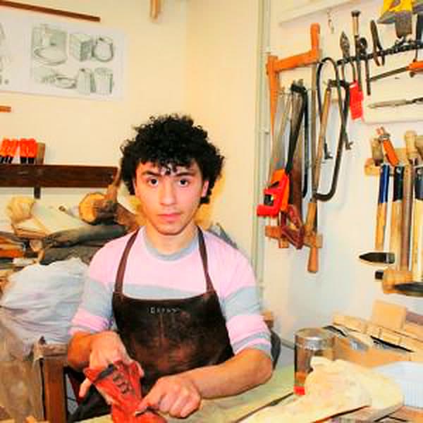 Manuk in the woodworking workshop at Orran
